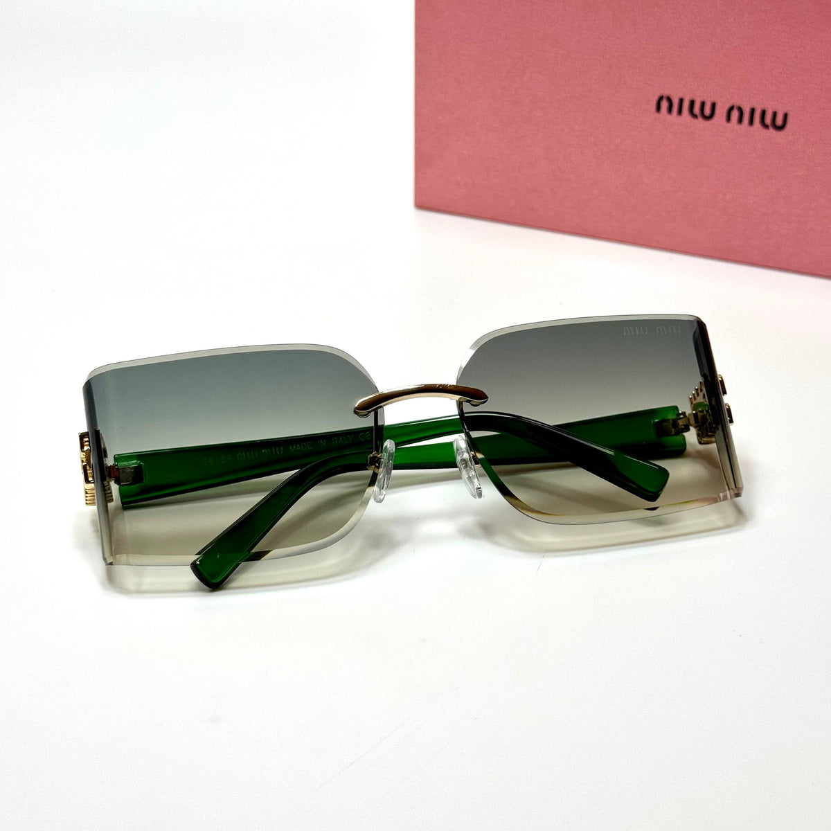 Miu Miu Rimless Rectangular MU09YS Green Gradient women's sunglasses Lebanon - green temples with gold miu miu detailing frame, green gradient lenses - ChronoVault - view 4