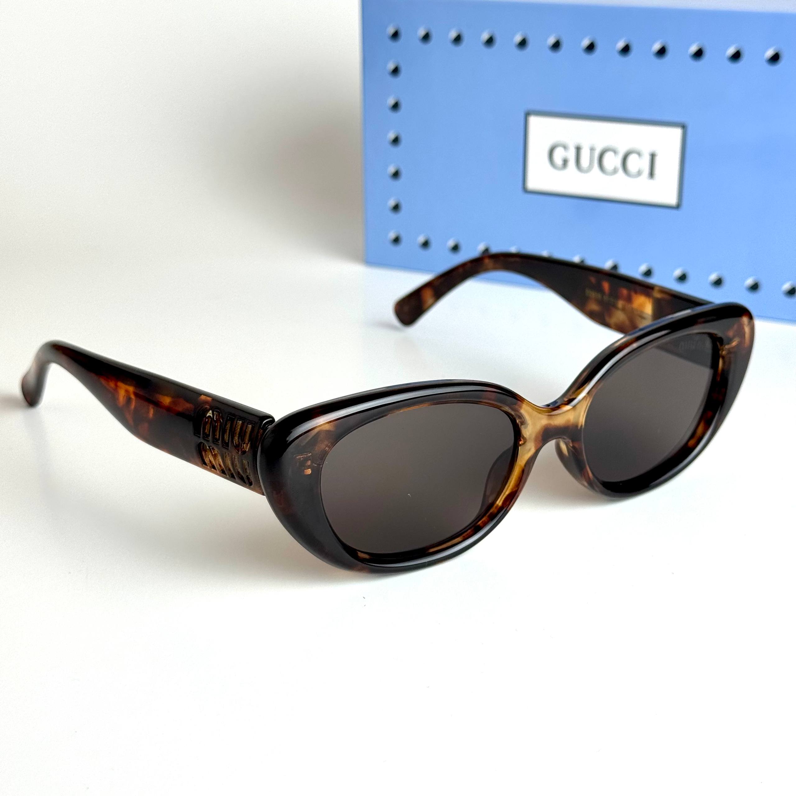Miu Miu SMU 11ZS – Havana Brown