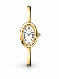 Baignoire de Cartier women's watch Lebanon - gold oval case, white dial with black Roman numerals and blue hands, slim curved gold bangle bracelet