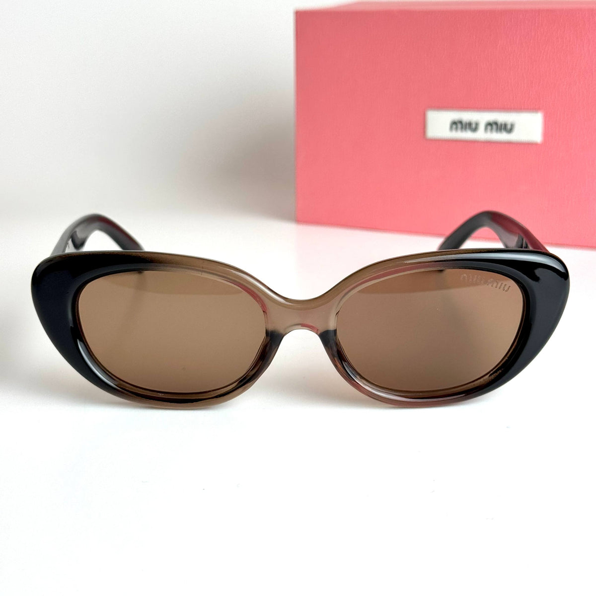 Miu Miu Oval SMU09Z Black Brown Sunglasses Lebanon - ChronoVault - view 4