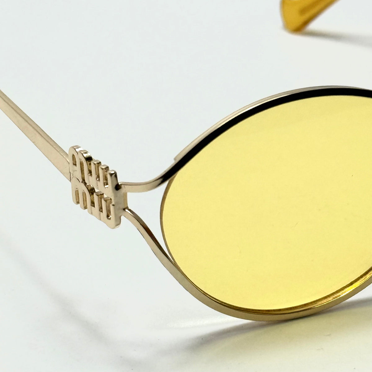 Miu Miu SMU 50T Gold Yellow women's sunglasses Lebanon - ChronoVault - view 2