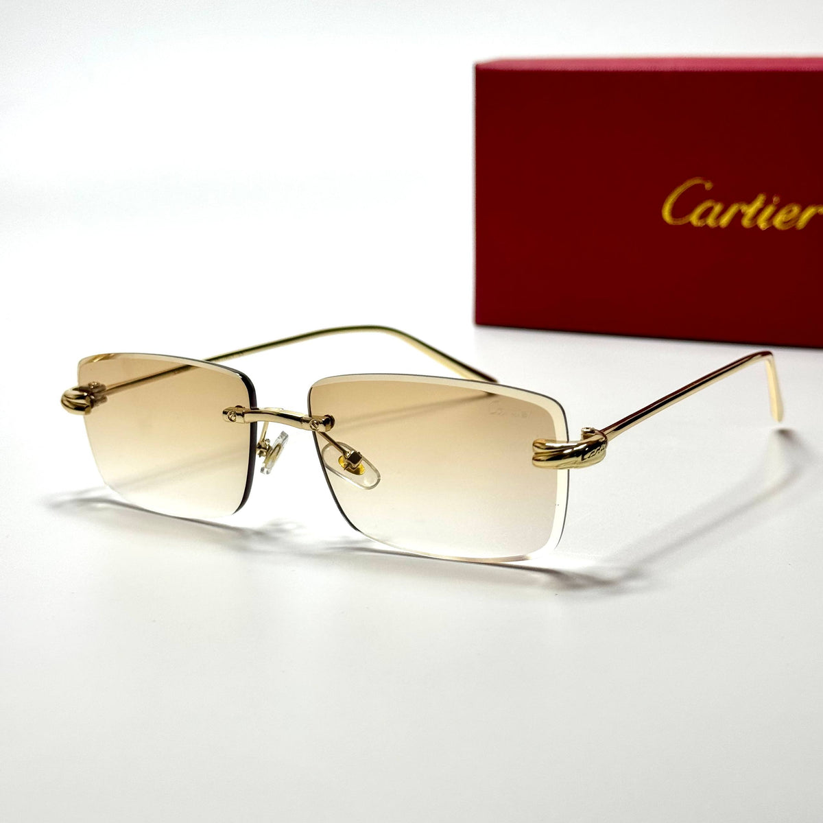 Cartier Rimless CT0092O Gold Champagne unisex sunglasses Lebanon - polished gold-tone metal frame, champagne gradient lenses - ChronoVault