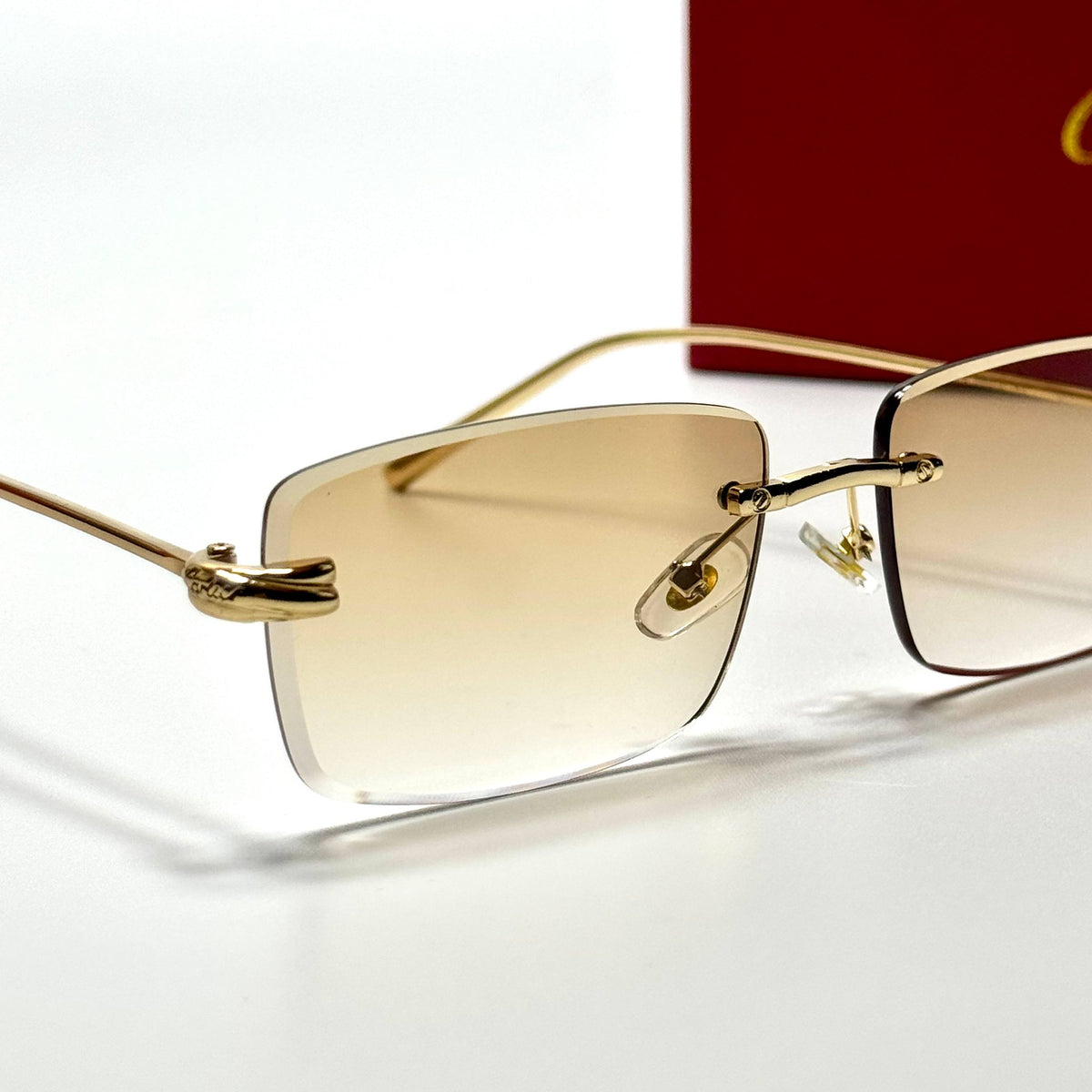 Cartier Rimless CT0092O Gold Champagne unisex sunglasses Lebanon - polished gold-tone metal frame, champagne gradient lenses - ChronoVault - view 2
