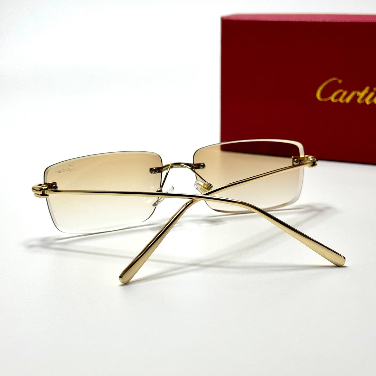 Cartier Rimless CT0092O Gold Champagne unisex sunglasses Lebanon - polished gold-tone metal frame, champagne gradient lenses - ChronoVault - view 3