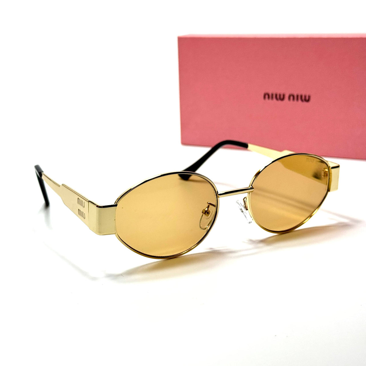 Miu Miu Round SMU50Y Gold Amber women's sunglasses Lebanon - slim gold-tone metal frame, warm amber lenses - ChronoVault - view 4