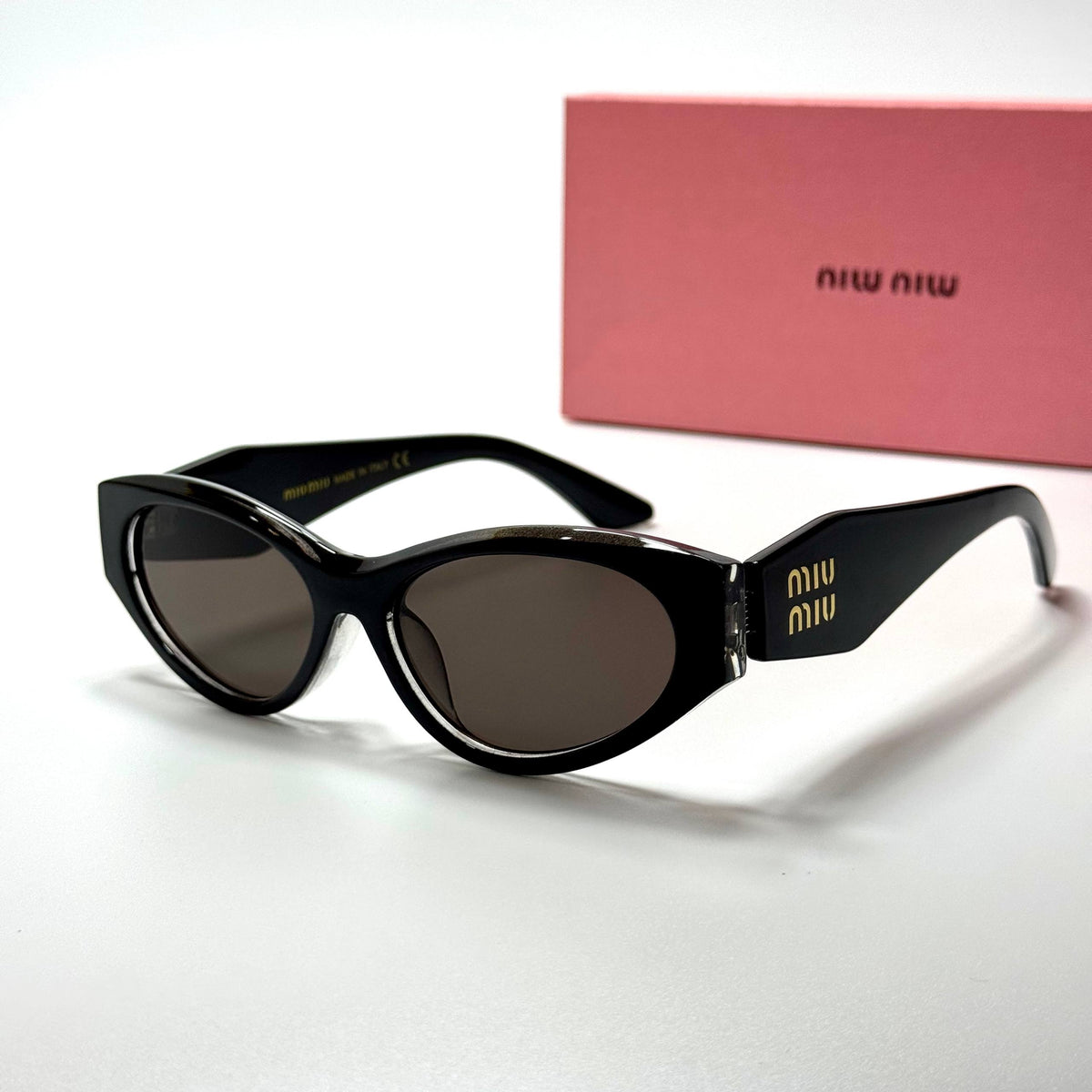 Miu Miu Cateye MU11ZS Black Brown women's sunglasses Lebanon - glossy black with gold miu miu temple detailing frame, dark brown lenses - ChronoVault