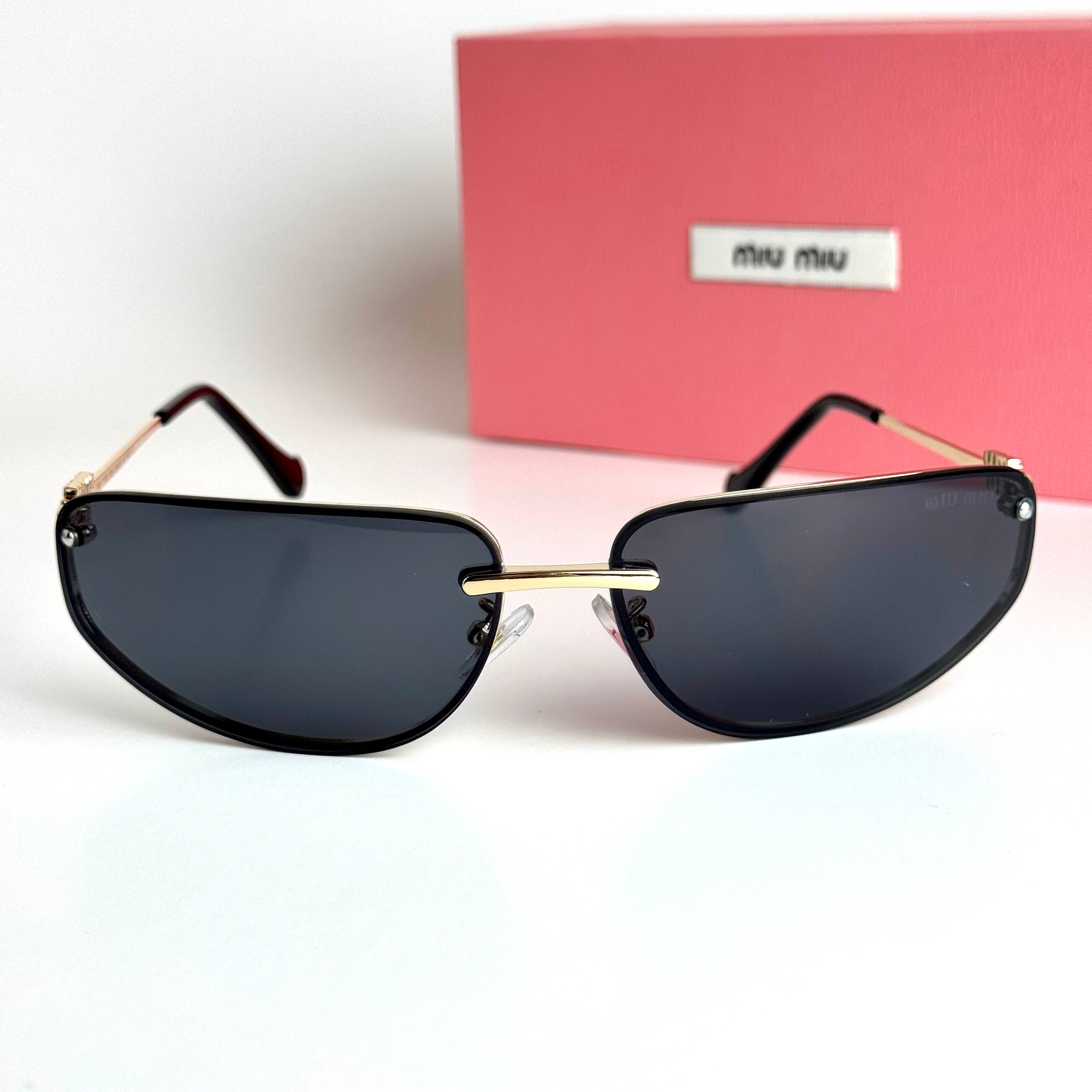 Miu Miu SMU73Z Gold Black Sunglasses Side View Lebanon - ChronoVault