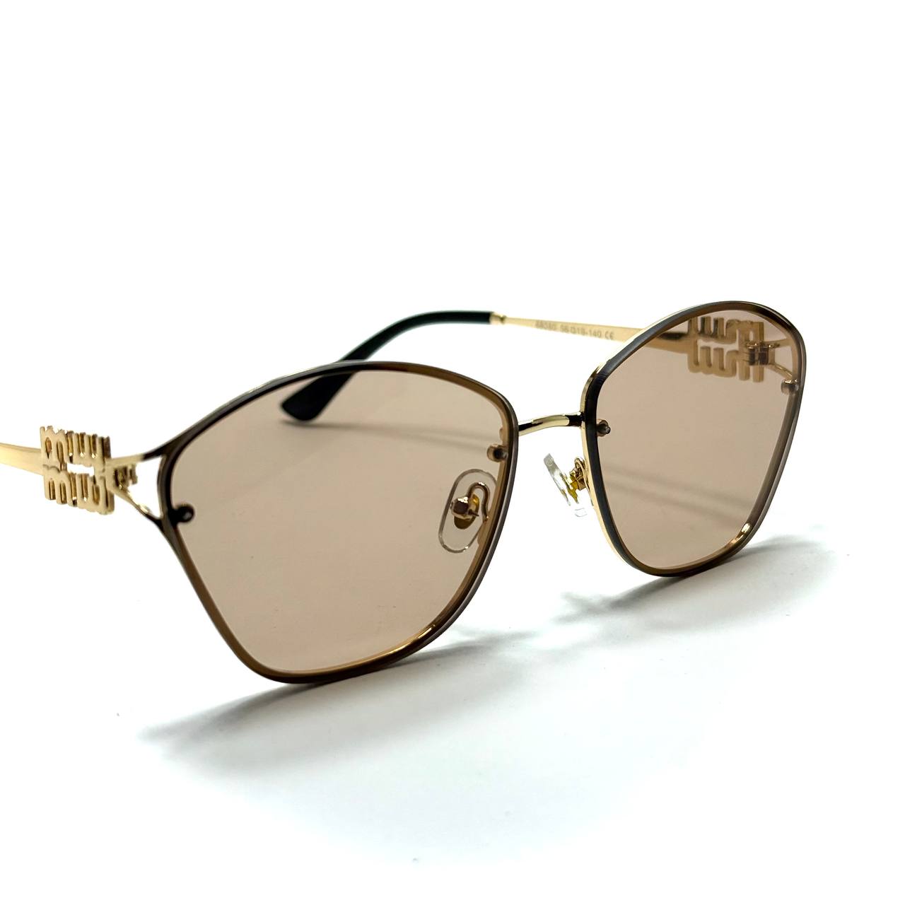 Miu Miu Cat-Eye Metal Gold Champagne Bronze Sunglasses Detail Lebanon – ChronoVault
