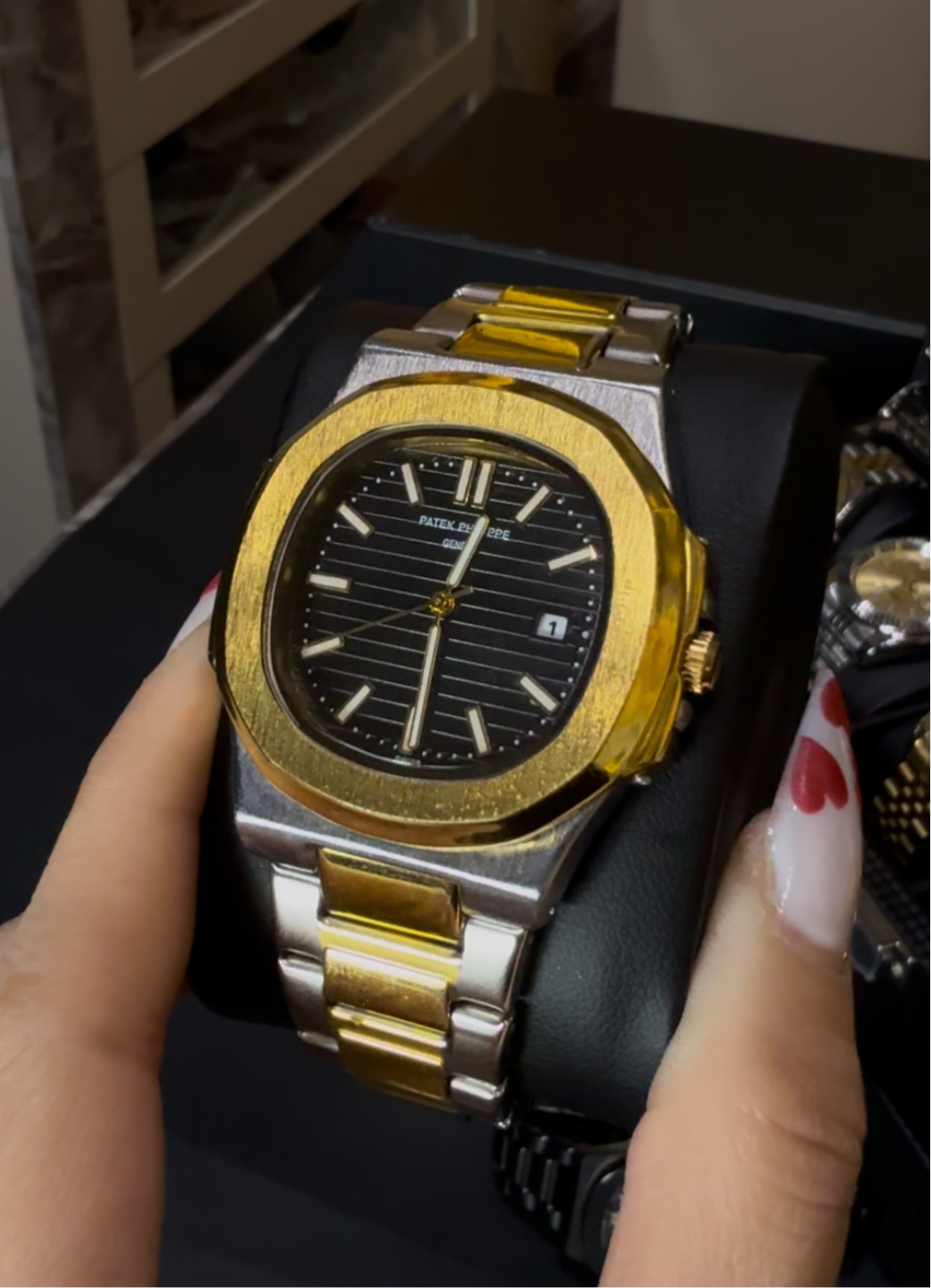 Patek Philippe Nautilus 5711 /1J - Yellow Gold & Stainless Steel with Black Dial