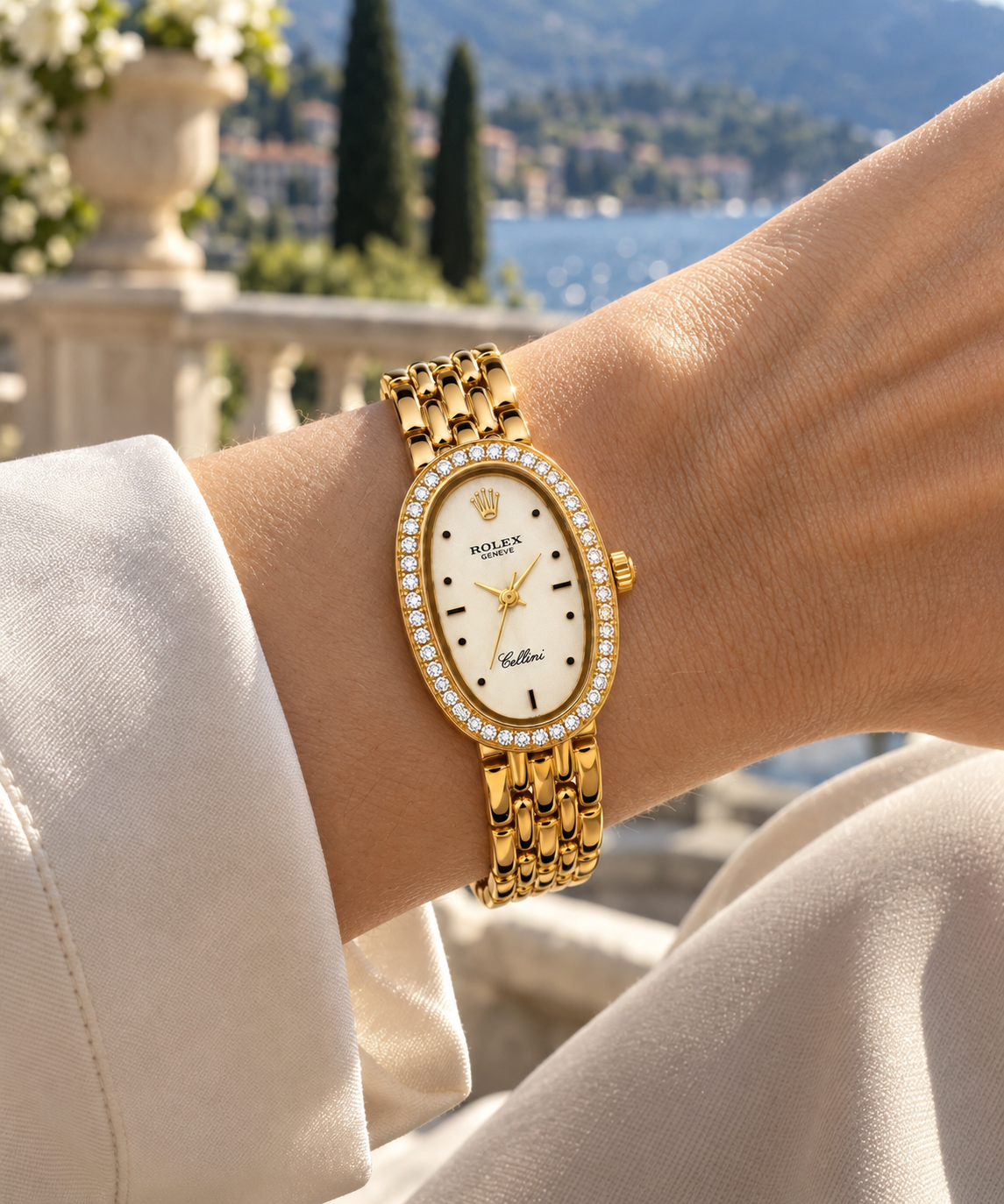 Rolex Cellini women's watch on wrist Lebanon - yellow gold oval case with diamond bezel, cream dial with black-accent markers, gold link bracelet