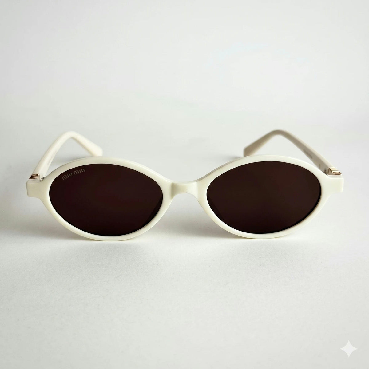 Miu Miu SMU10Q Cream Beige Sunglasses Angle Lebanon – ChronoVault