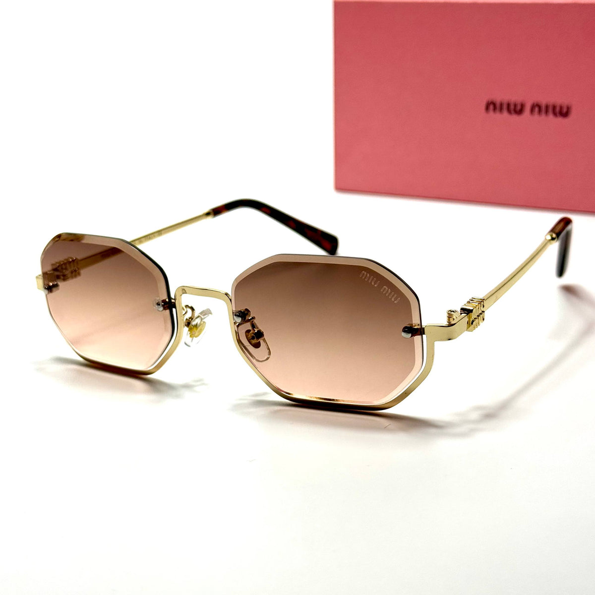 Miu Miu Geometric SMU52W Gold Pink Gradient women's sunglasses Lebanon - ChronoVault