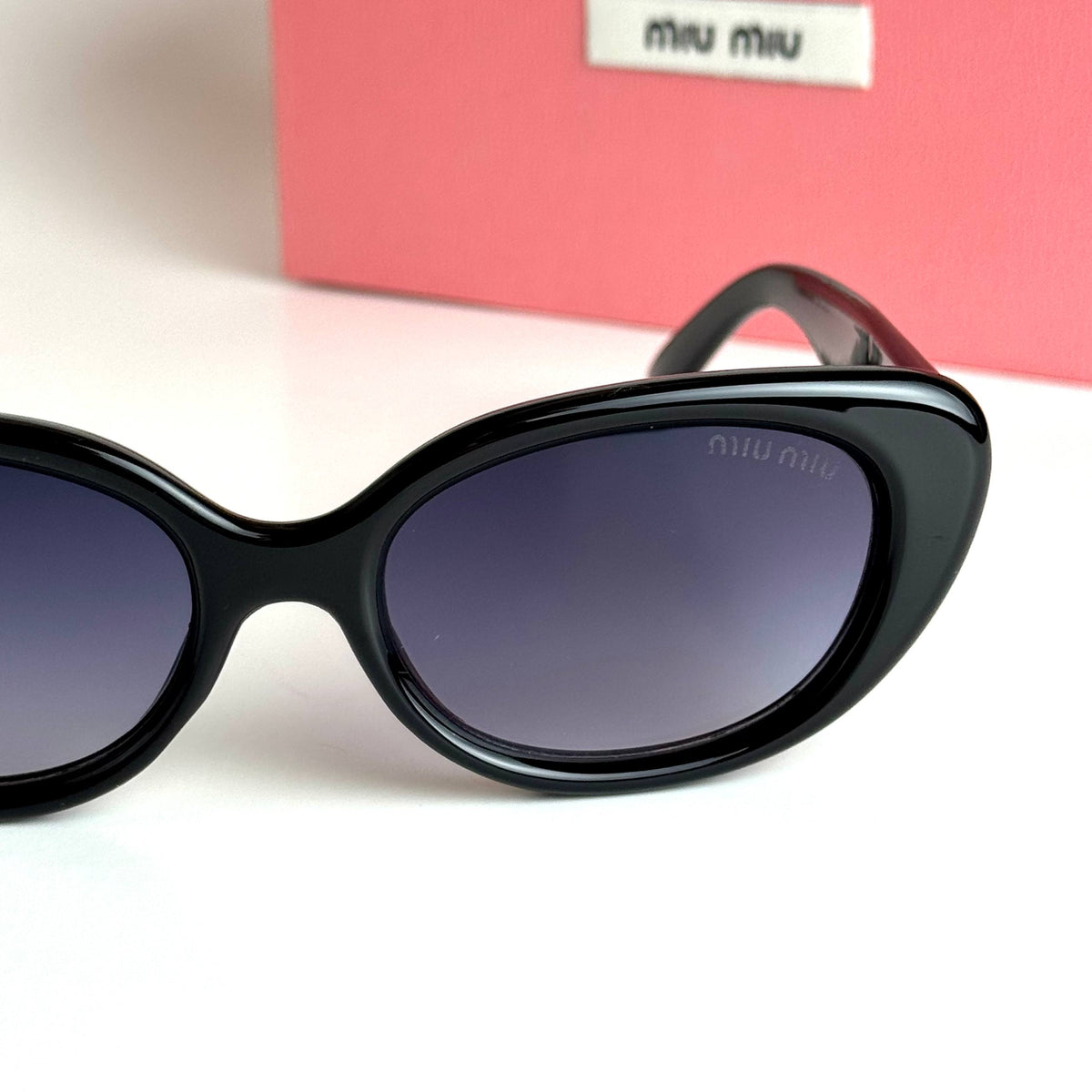 Miu Miu MU09ZS Black Blue Gradient Sunglasses Front View Lebanon - ChronoVault - view 4