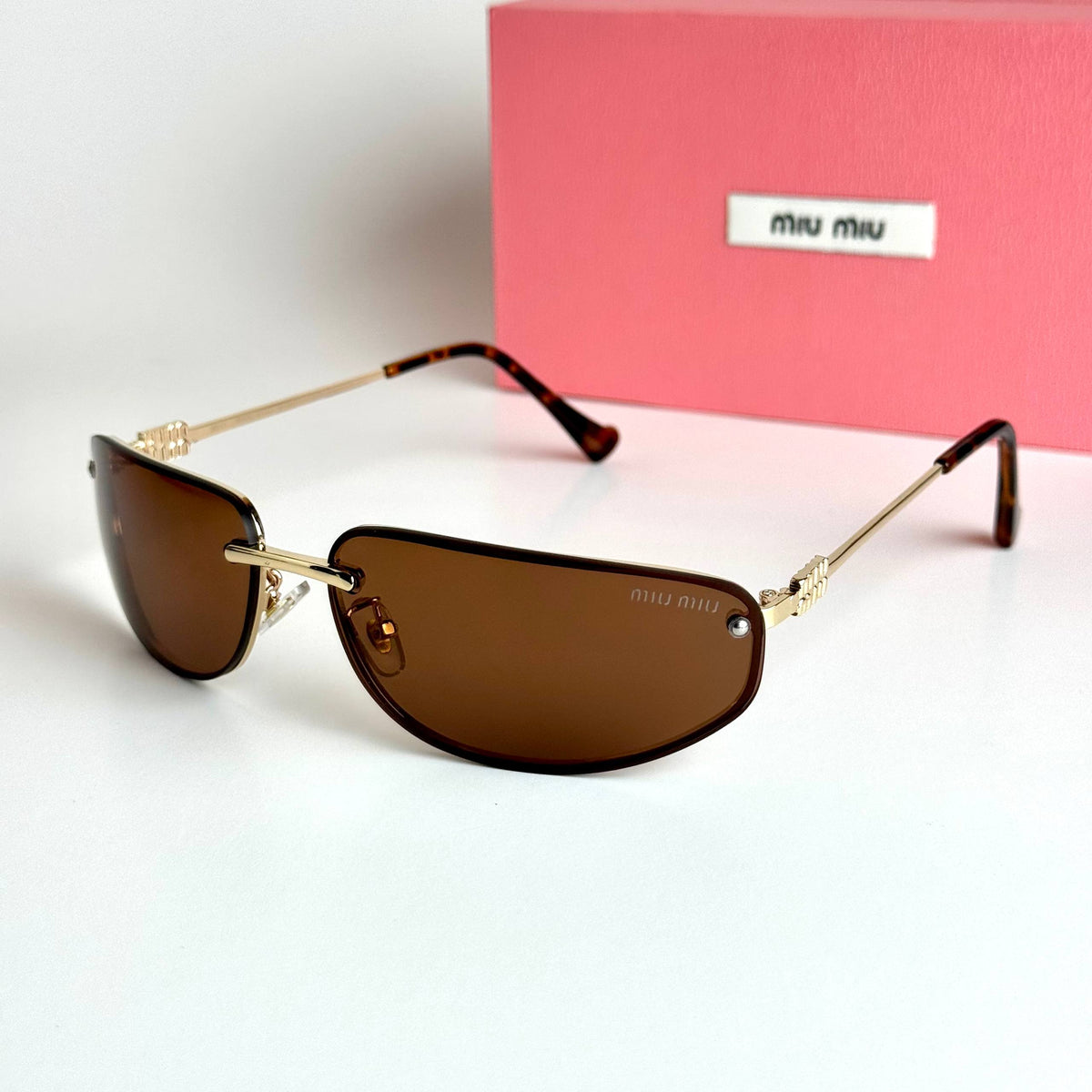 Miu Miu SMU73Z women's sunglasses Lebanon - Gold frame, Brown lenses - ChronoVault