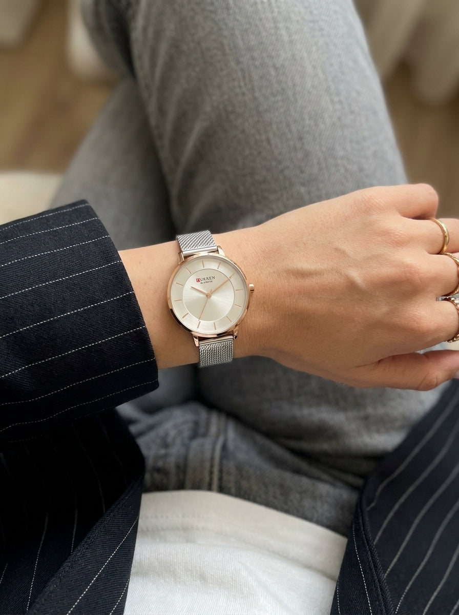 Curren Silver Mesh Rose Gold Minimalist Women's Watch worn on model wrist Lebanon - ChronoVault