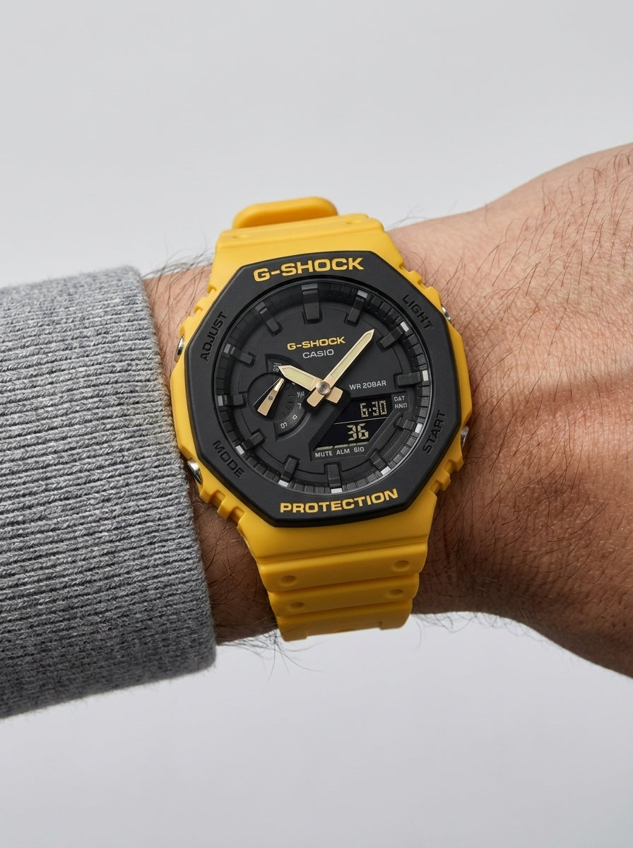 Casio G-Shock Yellow Black Ana-Digi Men's Watch worn on model wrist Lebanon - ChronoVault