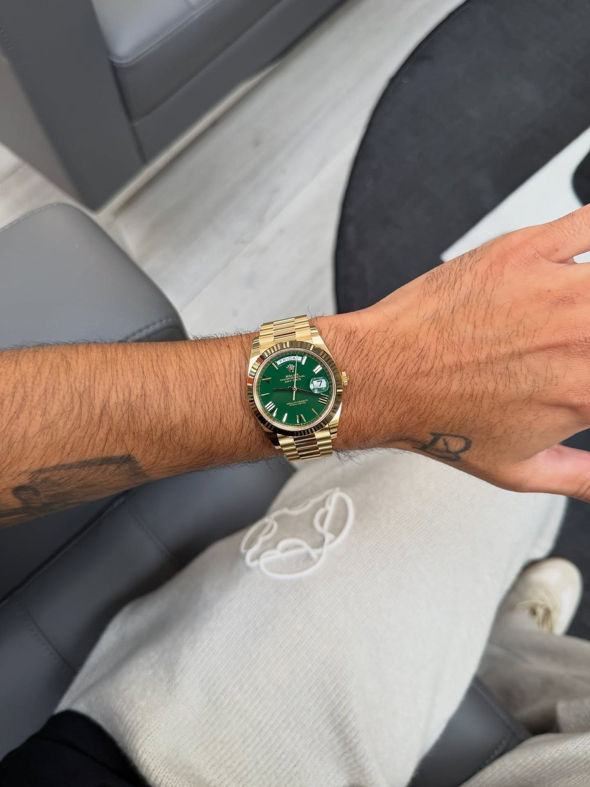 Rolex Day-Date 40 yellow gold green Roman dial worn on wrist - Lebanon | ChronoVault